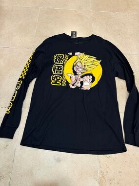 Black Long Sleeve Graphic Tee with Yellow Anime Design